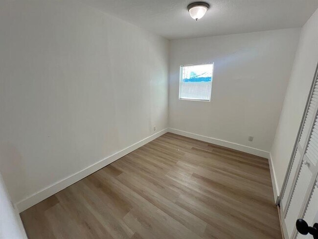 Building Photo - 10540 NW 28th Ave