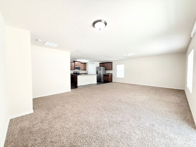 Building Photo - Spacious 4BR Home with Large Fenced Yard & Community Pool