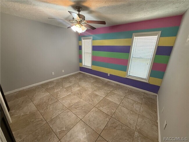 Building Photo - 5560 S Garcia Terrace