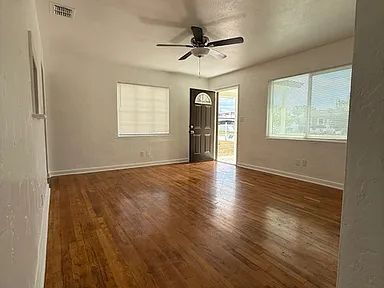 Building Photo - Charming Centrally Located Home | Wood Floors + Fenced Yard