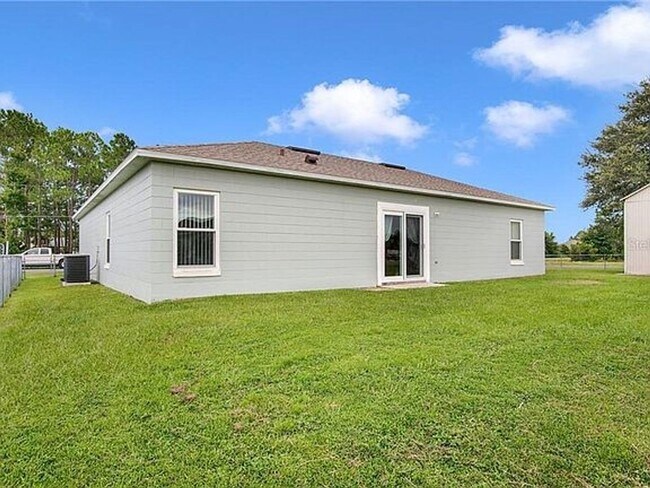 Building Photo - SINGLE FAMILY HOME IN POINCIANA 3/2