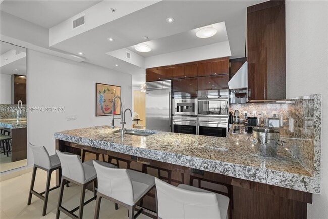 Building Photo - 9703 Collins Ave