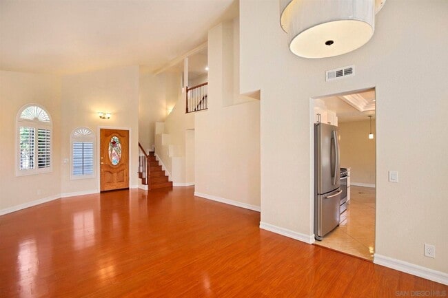 Building Photo - 4 Bed/2.5 Bath Home in Poway. Open Floor Plan, AC/Heat, W/D + Laundry Room and 3 Car Garage!