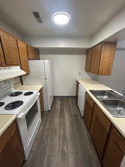 Galley Kitchen without microwave - Spansail Court Apartments