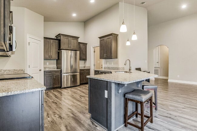 Building Photo - This beautifully maintained 3-bedroom, 2-bathroom residence offers the perfect blend of comfort, ...