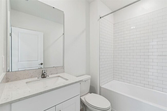 Building Photo - 1712 Tropical Oasis Ave