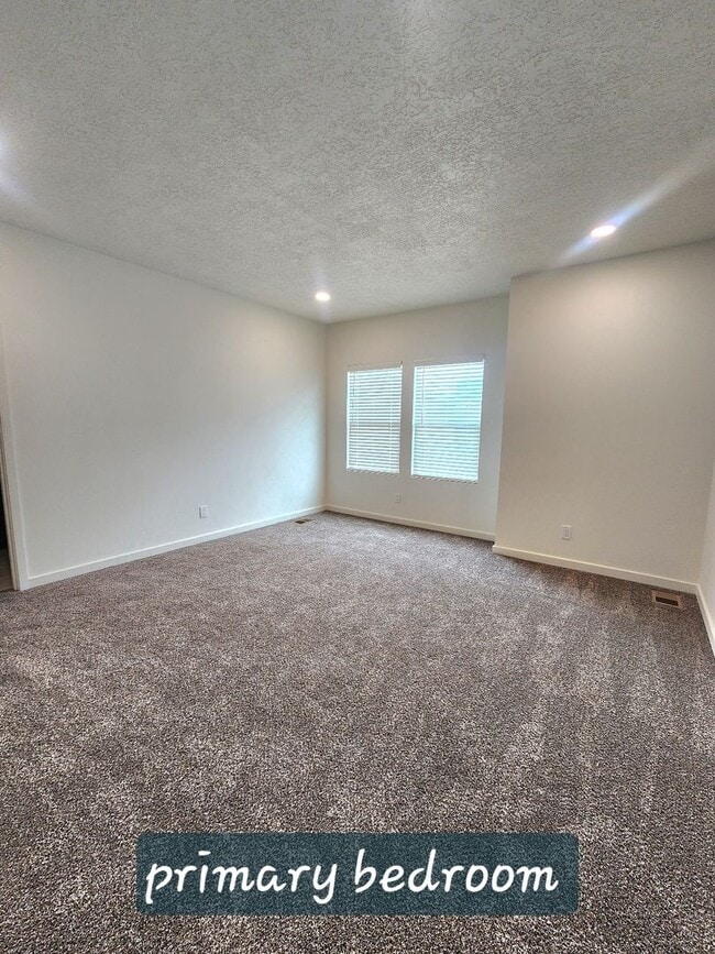 Building Photo - Brand-New Construction Townhome – Never Li...