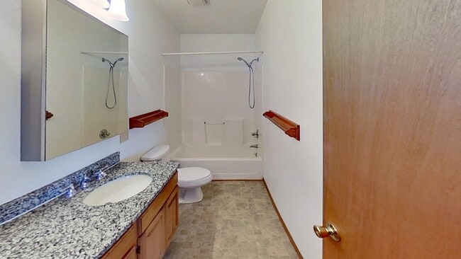 Building Photo - Two story duplex with two large bedrooms, walk in closet, one and a half bath, full basement.