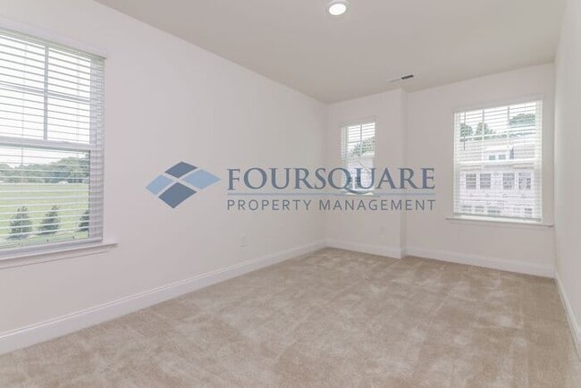 Building Photo - End Unit Townhome | Back Patio with Privac...
