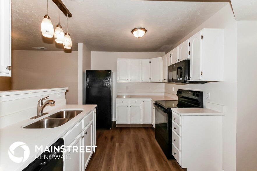 Building Photo - 6368 Titania Dr