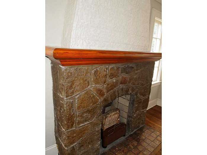 Large mantle to display picture frames, candles, trophies and more. - 1733 Melrose Dr SW