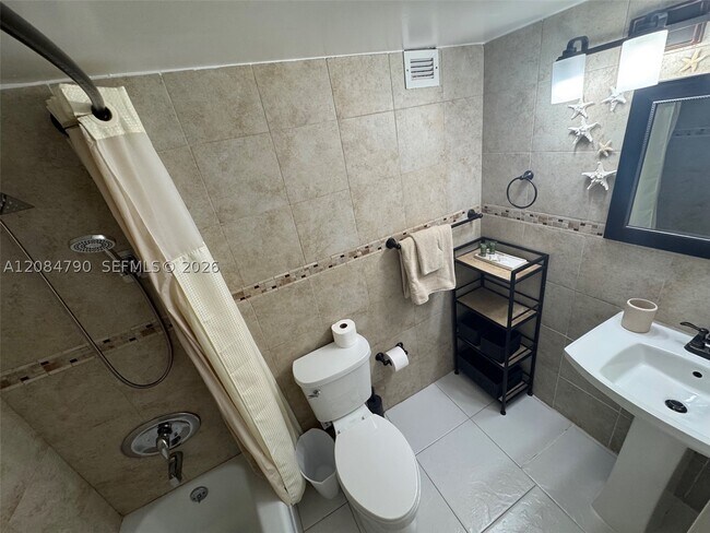 Building Photo - 3180 S Ocean Dr