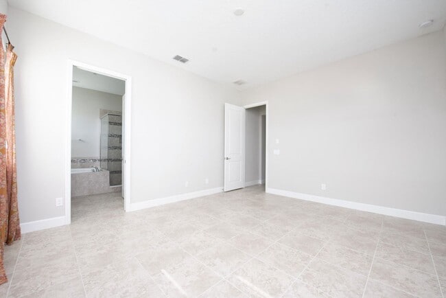 Building Photo - Modern 2 bedroom, 2 bath Townhouse with Bonus Room in the Laureate Park Community of Lake Nona.