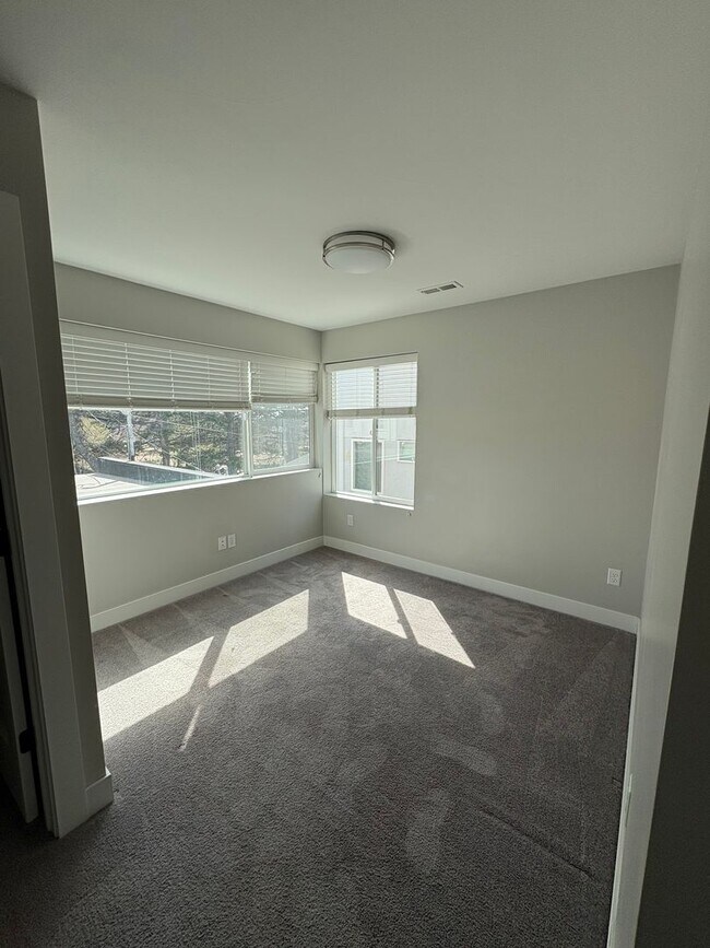 Building Photo - Modern 2 Bed + Flex Townhome with Rooftop Deck Near Paco Sanchez Park & Light Rail