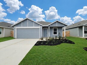 Building Photo - This great new single-story design makes smart use of the space available. At the front are all t...