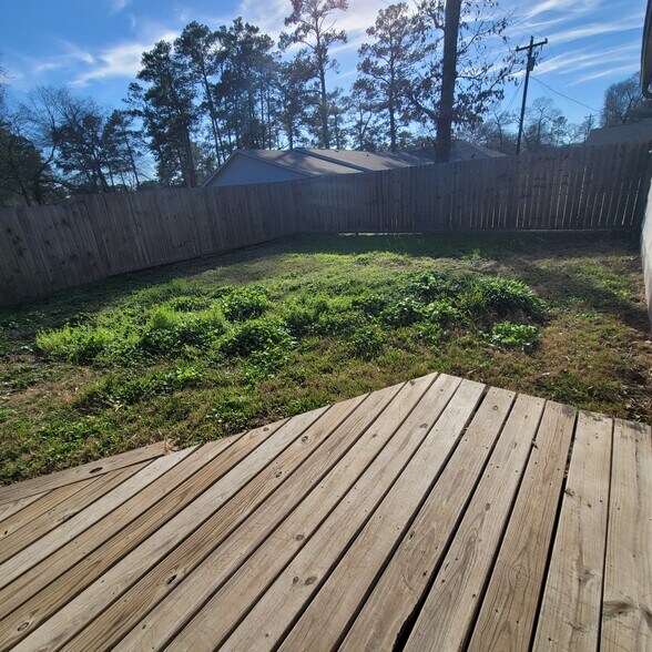 Deck to the back yard - 26445 Lazy Ln