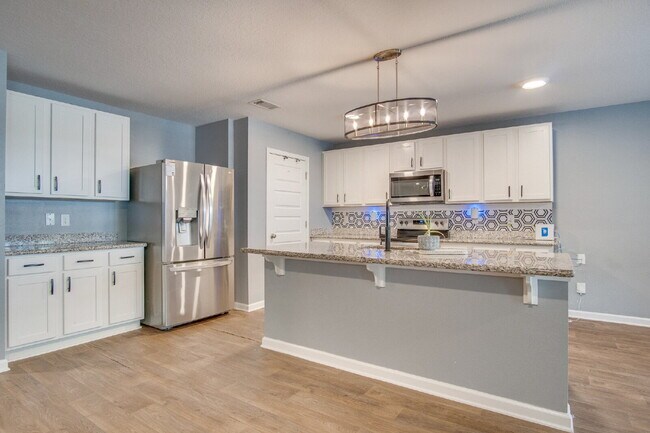 Building Photo - Move In for the Holidays! Heated Saltwater Pool & Tropical Backyard –$500 OFF First Month + Milit...