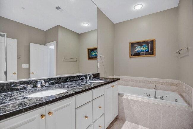 Building Photo - Stunning 4BR All-Brick End-Unit Townhome with Rooftop Terrace in Potomac Greens