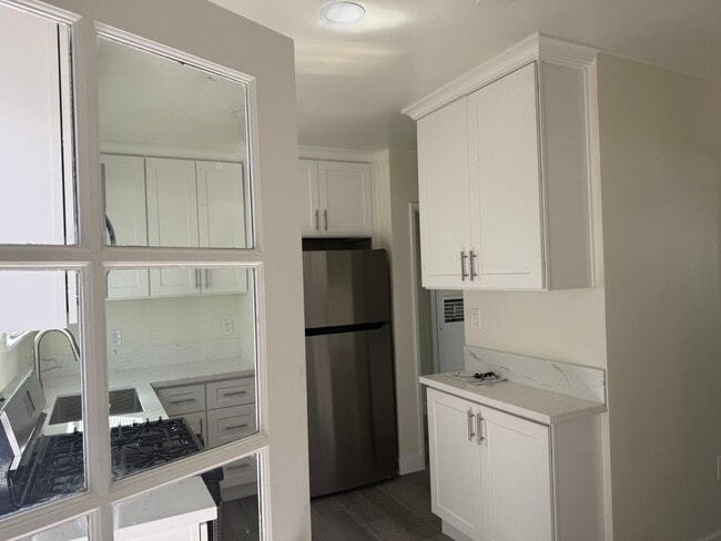 Building Photo - FOR RENT — COMPLETELY REMODELED Apartment