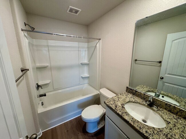 Building Photo - Located in Creedmore Hills a 4BR/2.5BA home with 2 car garage