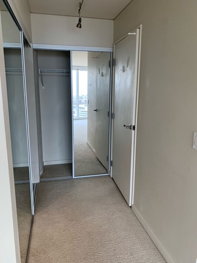 Building Photo - Moana Pacific - 2 bedroom plus den, 2 bath Condo with 2 parking - avail now!