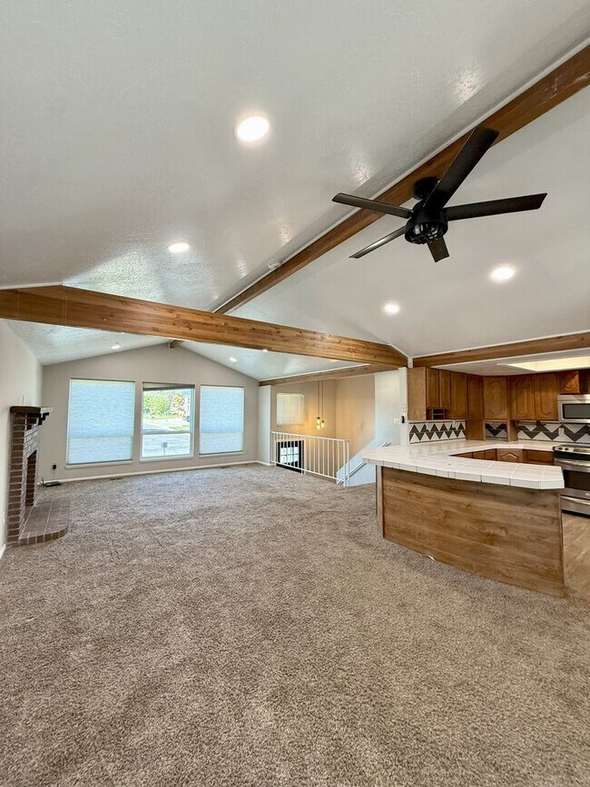 Building Photo - Spacious Comfort Meets Practical Living in...