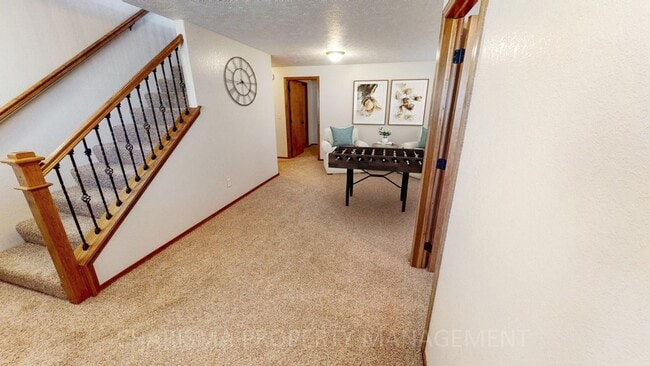 Building Photo - BEAUTIFUL 4 BD, 2 BA TOWNHOME WITH A FULLY EQUIPED KITCHEN, VAULTED CEILINGS, FIREPLACE, ATTACHED...