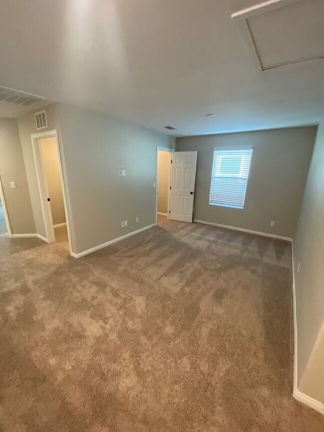 Building Photo - Americana Property Mgmt - 2022 built 4 bedrooms in prime South West Las Vegas