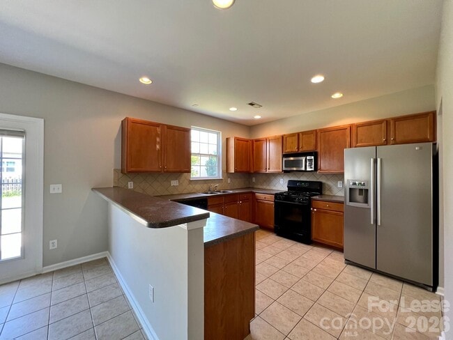 Building Photo - 10311 Dominion Village Dr