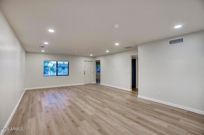 Building Photo - 8015 W Roma Ave