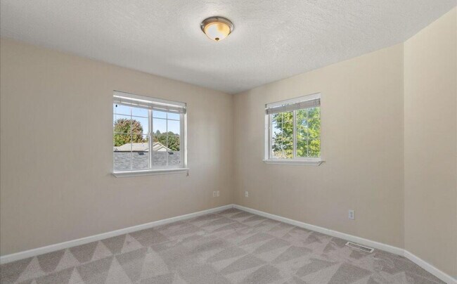 Building Photo - 4995 N Tasman Dr