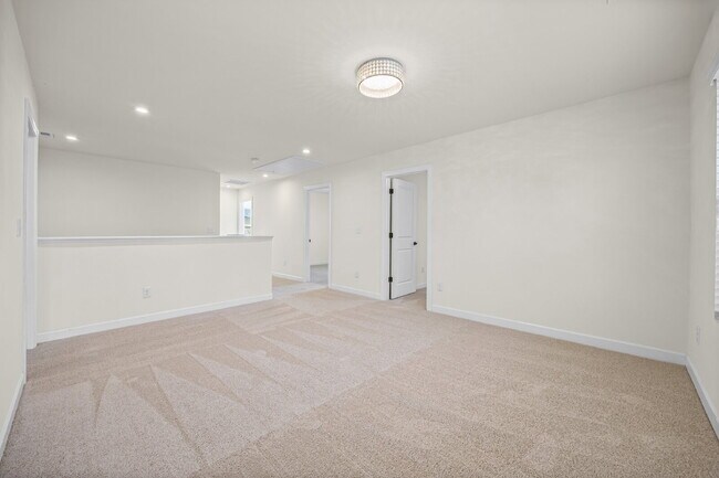 Building Photo - Classic finishes paired with an open, versatile layout!