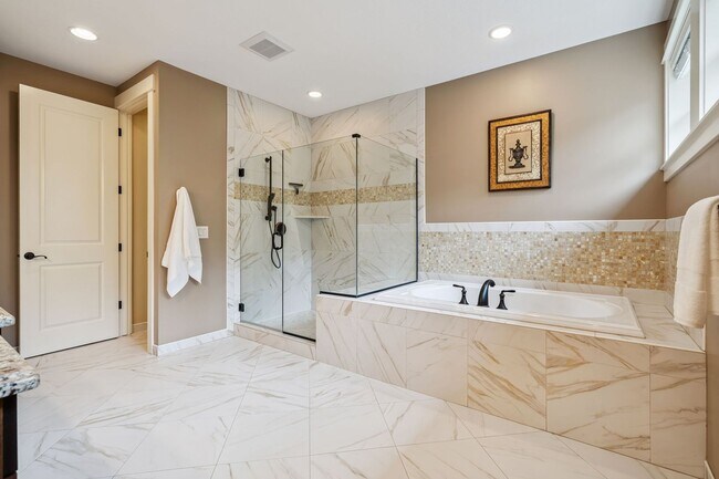 Building Photo - 2 Creeks Condominiums - Gated Community on...