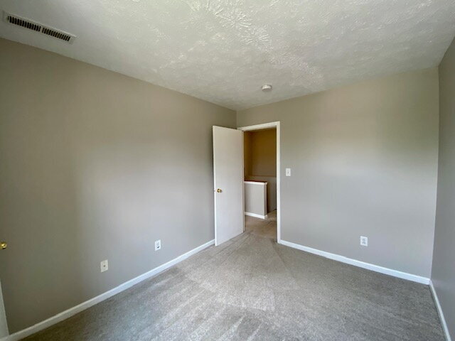 Building Photo - Welcome home to this stunning 3-bedroom, 2.5-bath residence in the desirable Meridian Place neigh...
