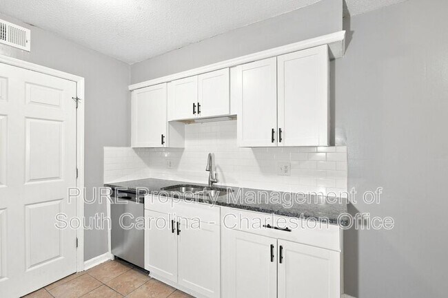 Building Photo - 1402 Camp Rd