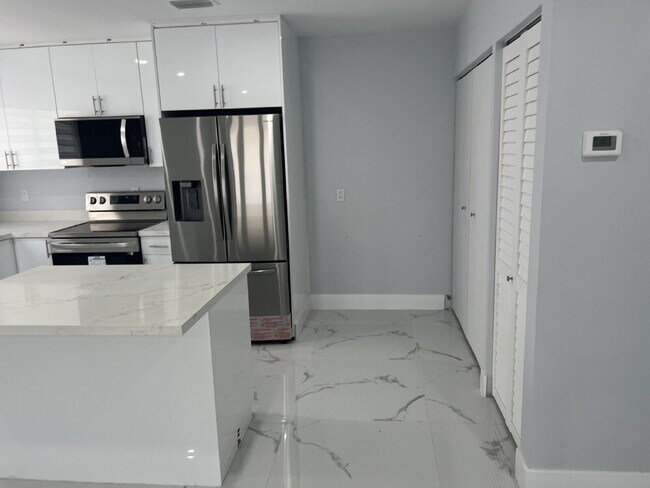 Building Photo - "Charming 2-Bed Retreat Waterfront W/Pool ...