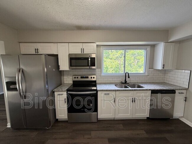 Building Photo - 4845 Downing Dr