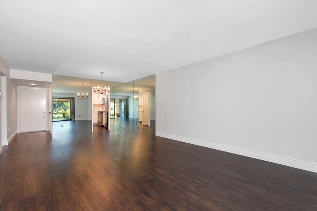 Building Photo - Lake and Golf Course View- Remodeled Condo w/ 2 Car Garage!