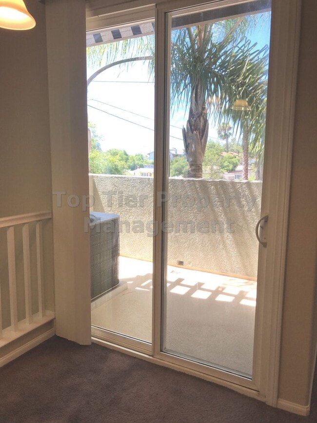 Building Photo - **Gated 3 bed, 3 bath Townhome with 2-Car ...