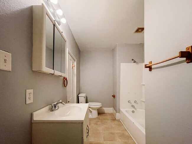 Building Photo - Near Local Shops and Restaurants