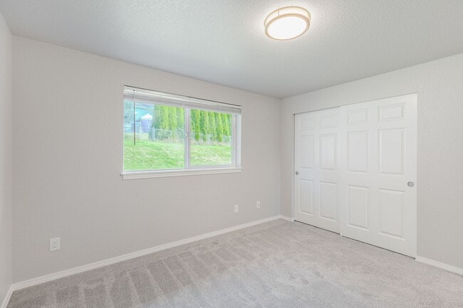 Building Photo - Recently updated 3 bdrm, 2 bath. Attached garage. Wrap around yard. Private upstairs bedroom and ...