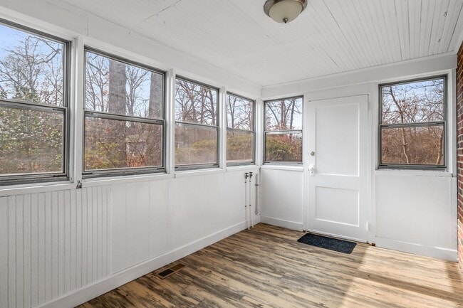 Building Photo - SW, Large Brick Two Bedroom PLUS Two Sun-Rooms, Hardwoods, LR & Separate DR, Fire Place!