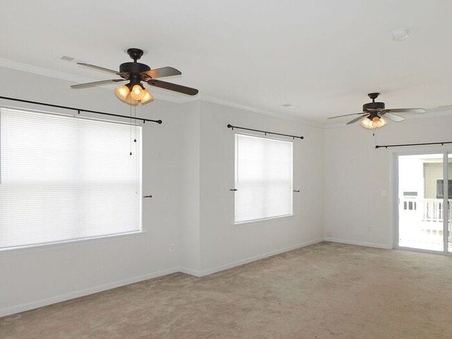 Building Photo - Pet Friendly Condo with Private Balcony and 1 Car Garage