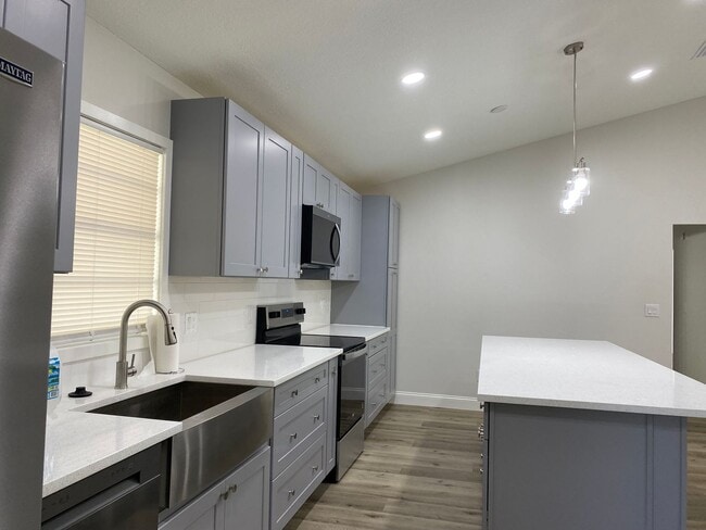 Building Photo - Totally refurbished three bedroom, two bat...