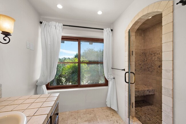 Building Photo - This Beautiful Hacienda Style Home combine...