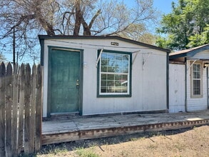 Building Photo - Move In Special: Half off the first month's rent with a 14-month lease.

Updated Rear Unit