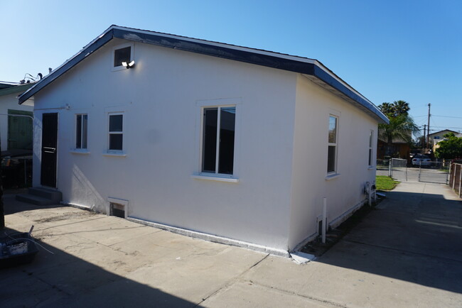 Rear of unit/driveway/new windows - 224 W 84th St