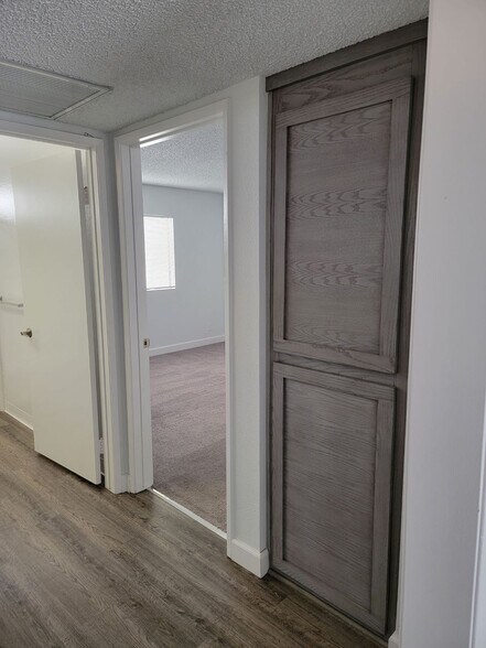 Linen closets and doorway to second bedroom - 3751 S Canfield Ave