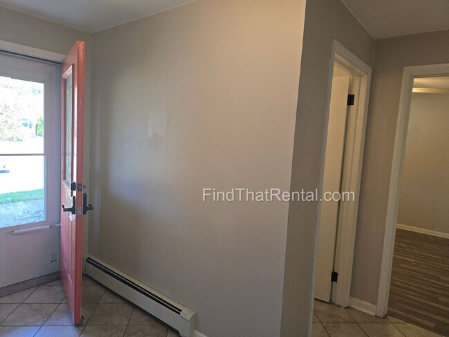 Building Photo - Available Immediately! Pet friendly, 2 car...