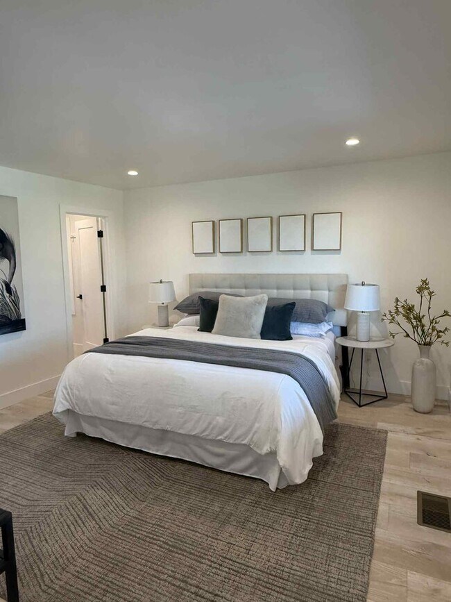 Building Photo - Modern 4-Bedroom Retreat in San Carlos – Remodeled, Spacious, Private Yard